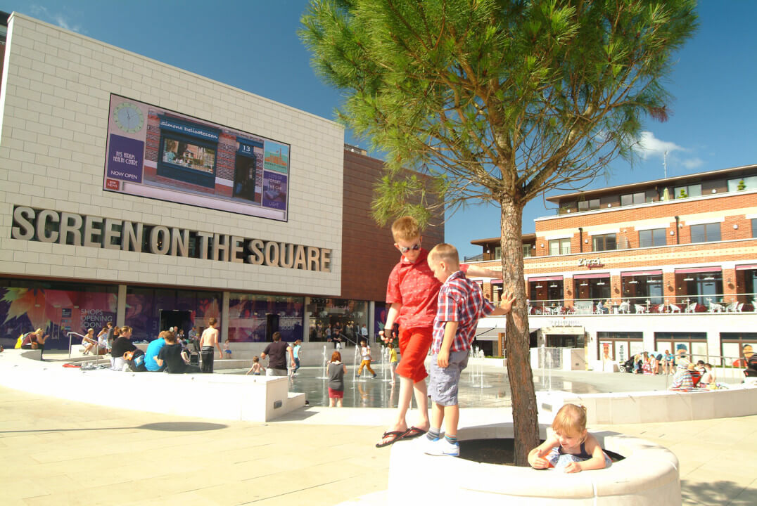 Kids playing in Brewery Square in Dorchester