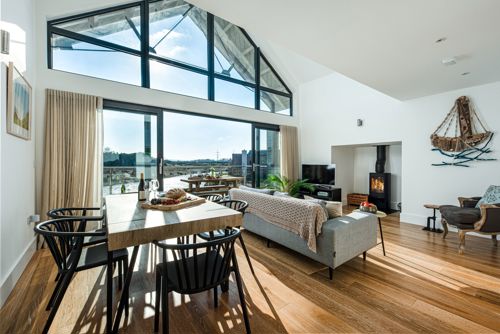 interior shot of a Silverlake holiday home showing a large window letting in natural light