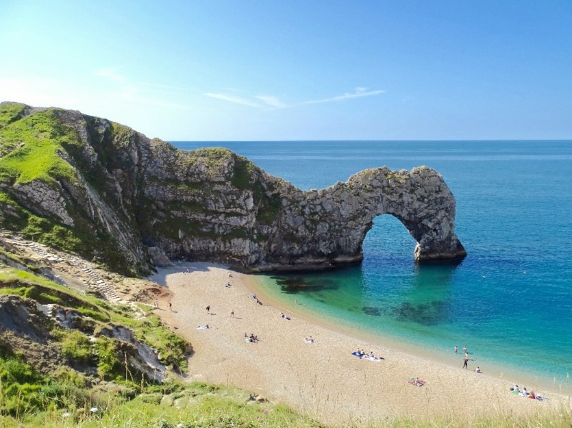 Durdle Door in Dorset on a sunny day